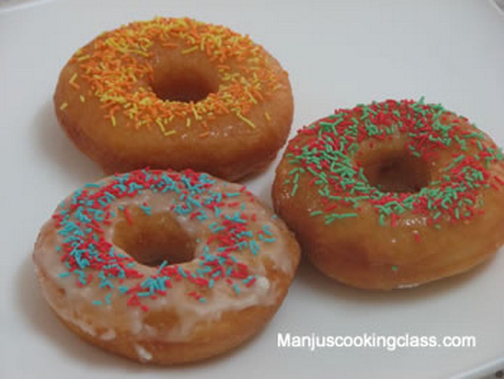 Doughnuts iced with sprinkles