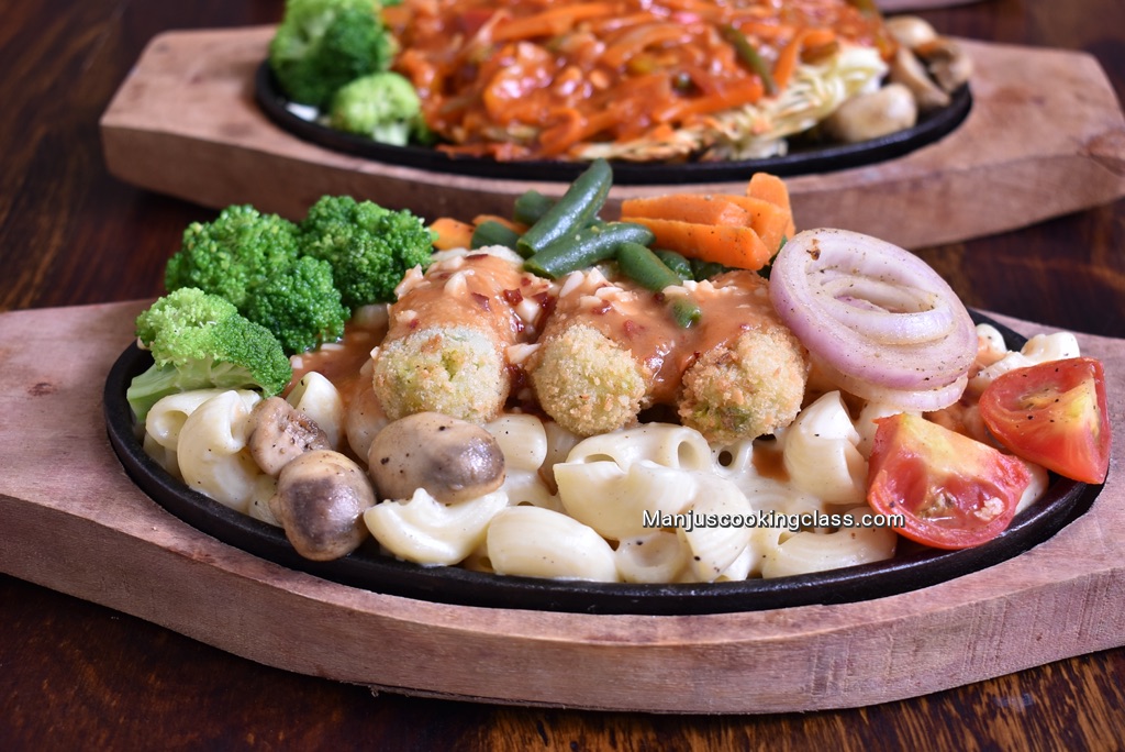 Veg Sizzler - Macaroni N Cheese Sizzler